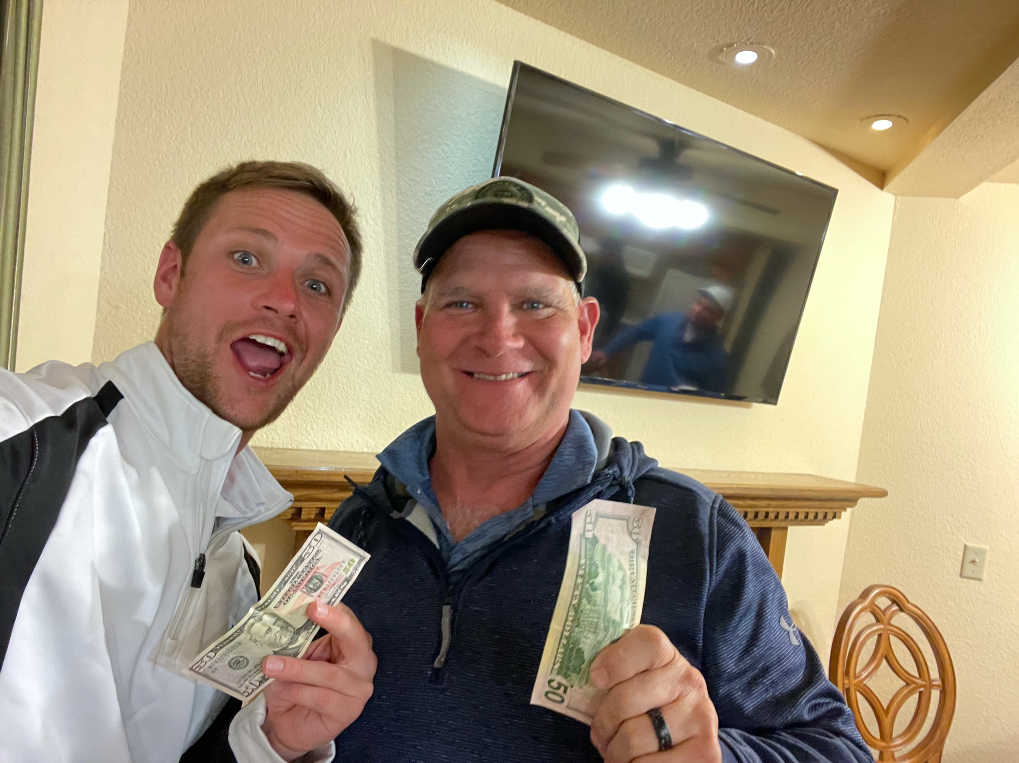 Bryan in his classic money pose with Jake beside him